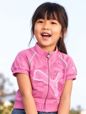 Puma girls short sleeved pink short jacket